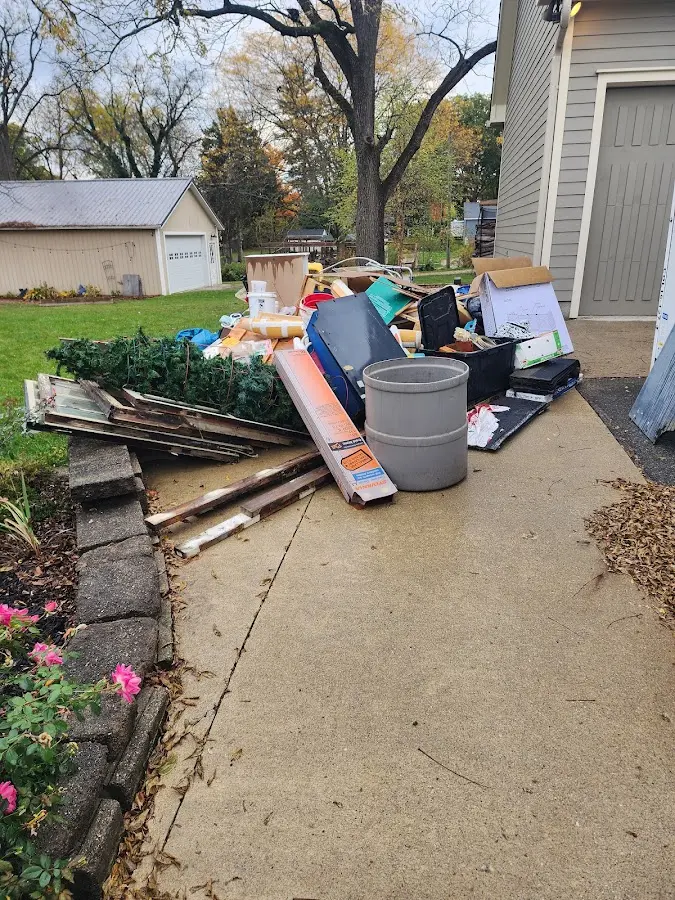 Dumpster being loaded with debris for 3 Yard Dumpster Rental in Torrance